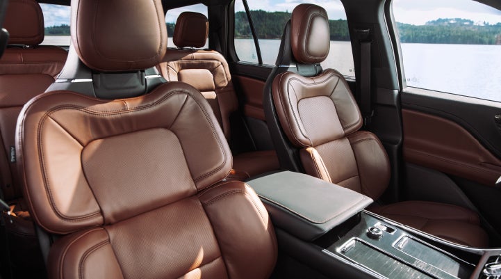 The front row's Perfect Position Seats in a 2024 Lincoln Aviator® Reserve model with Ebony Roast interior | Stivers Lincoln (AL) in Montgomery AL