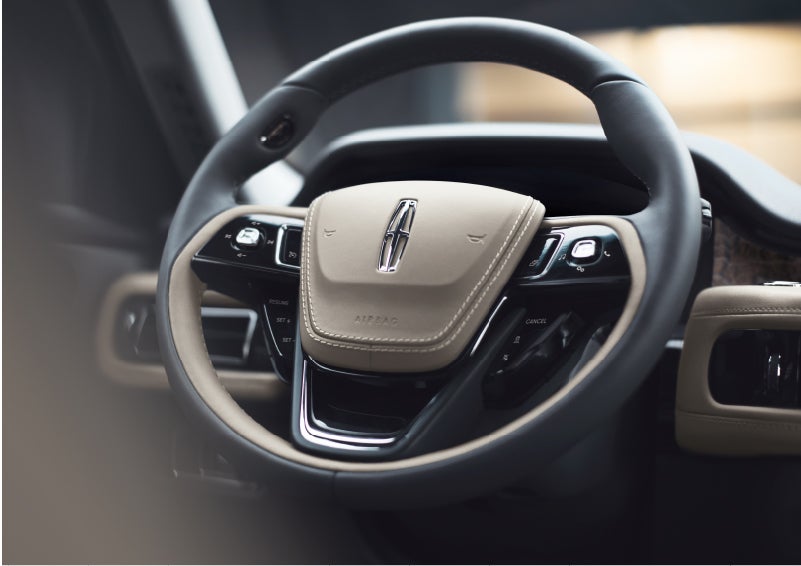 The intuitively placed controls of the steering wheel on a 2023 Lincoln Aviator® SUV | Stivers Lincoln (AL) in Montgomery AL