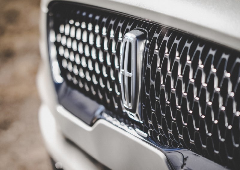 The grille of the 2024 Lincoln Aviator® Reserve model with an eye-catching repeated field of Lincoln Star logo shapes | Stivers Lincoln (AL) in Montgomery AL
