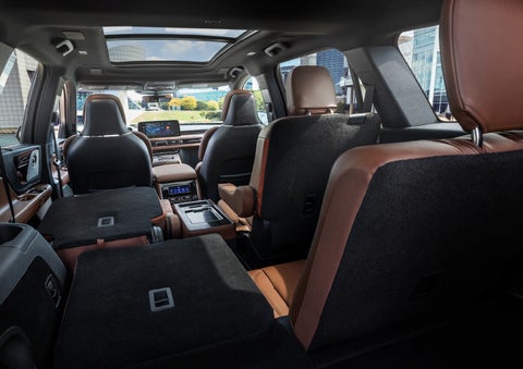 The interior of the 2025 Lincoln Aviator® SUV is shown with two seats folded down for added space. | Stivers Lincoln (AL) in Montgomery AL