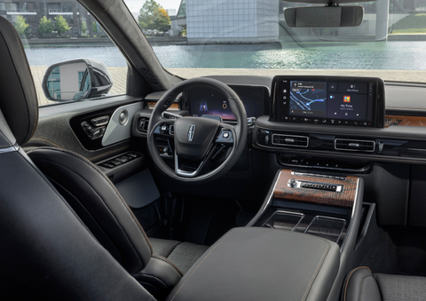 The interior of the 2025 Lincoln Aviator® SUV is shown parked with a view of a harbor through the windshield. | Stivers Lincoln (AL) in Montgomery AL