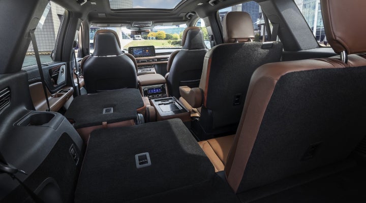 One side of the PowerFold® third-row seat and a second-row seat are folded forward in the 2026 Lincoln Aviator® SUV. | Stivers Lincoln (AL) in Montgomery AL