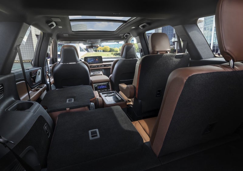 One side of the PowerFold® third-row seat and a second-row seat are folded forward in the 2026 Lincoln Aviator® SUV. | Stivers Lincoln (AL) in Montgomery AL
