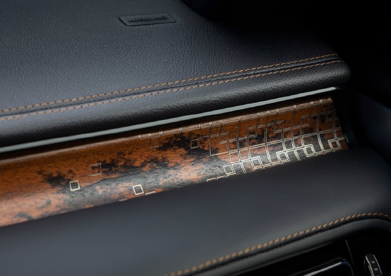 A close-up shot of the 2026 Lincoln Aviator® dashboard with unique black and brown accents and brown stitching. | Stivers Lincoln (AL) in Montgomery AL