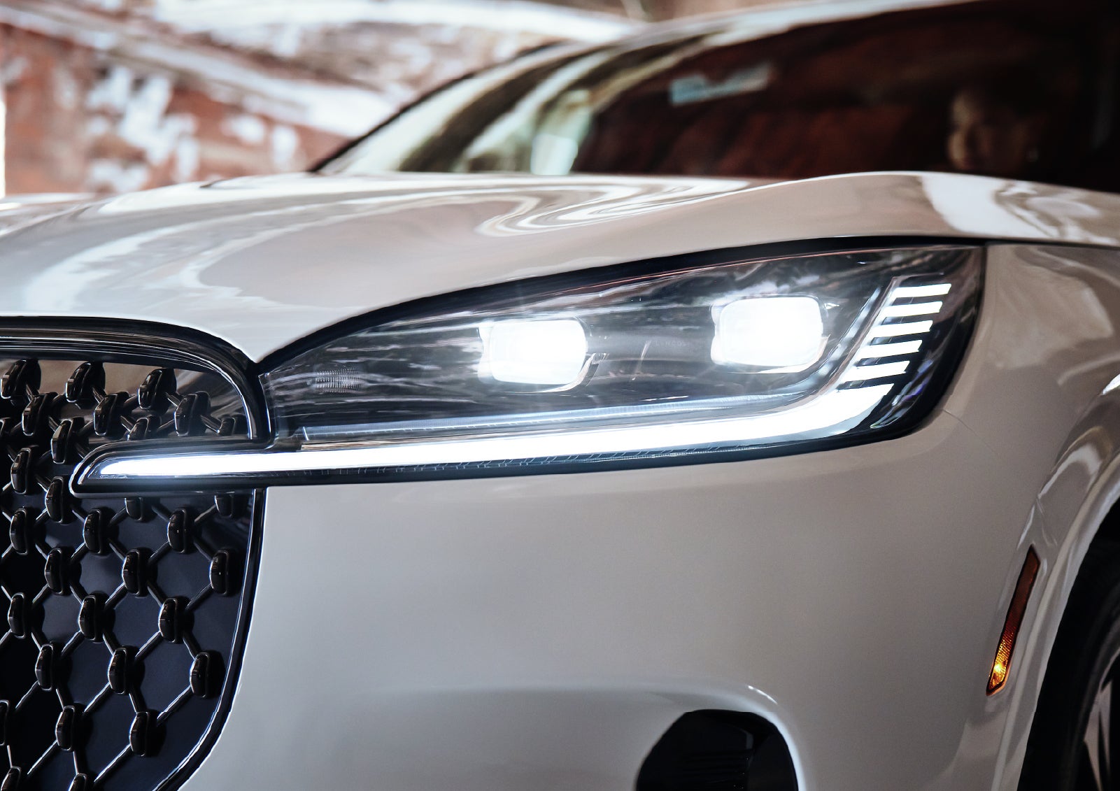 A close-up of a headlamp on the 2027 Lincoln Aviator® SUV is shown. | Stivers Lincoln (AL) in Montgomery AL