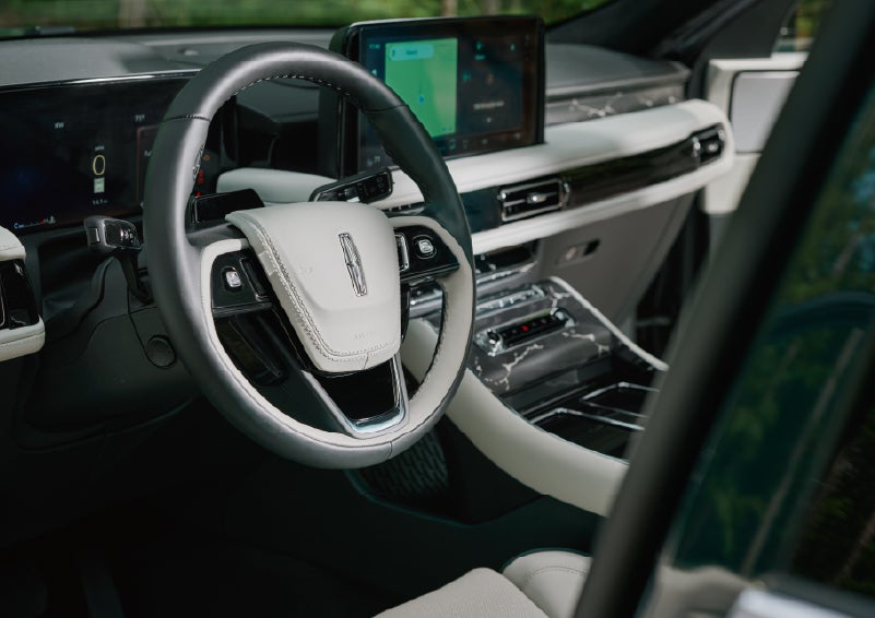 The leather-trimmed steering wheel of a 2027 Lincoln Aviator® Black Label™ SUV. | Stivers Lincoln (AL) in Montgomery AL